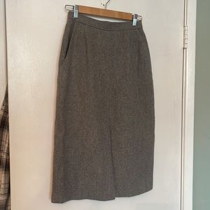 100% wool pencil skirt.  Slit front with pockets